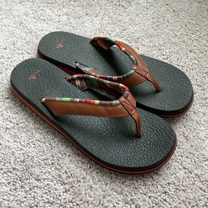 Brown Sanuk flip flops